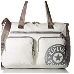 Gorgeous Kipling bag in lacquer pearl color. New with tags!